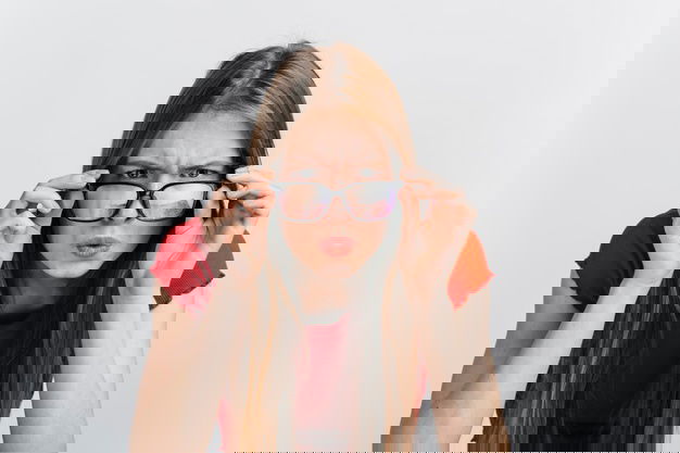 Skincare Tips For Oily Skin- The Ultimate Guide To Understand &Amp; Treat Acne! 16 Curious Woman With Glasses Staring 23 2148221739 1