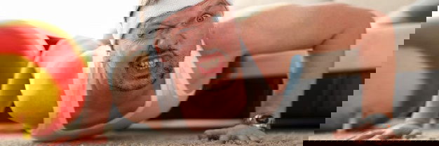 Funny Grimacing Man Making Push Ups Home During Coronavirus Quarantine Period Portrait 151013 7547