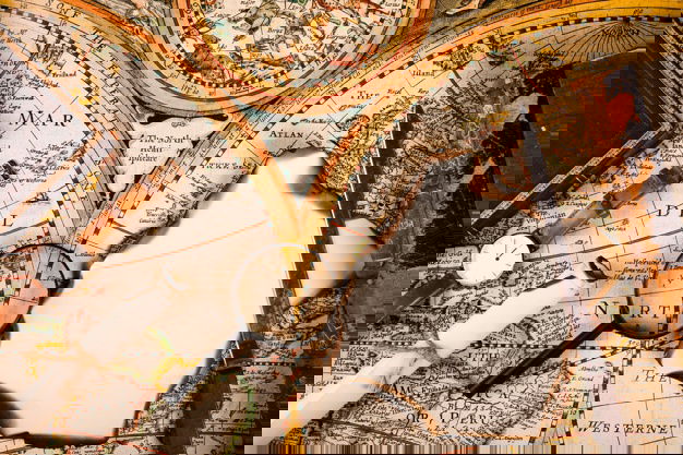 High Angle View Wrist Watch Magnifying Glass Burnt Paper Knife Map 23 2147837104