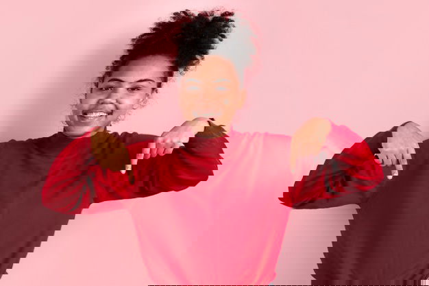 Figure Out The Easiest Night Shift Diet Ideas Before Becoming A Victim! 19 Smiling Woman Posing While Pointing Down 23 2148372494 2