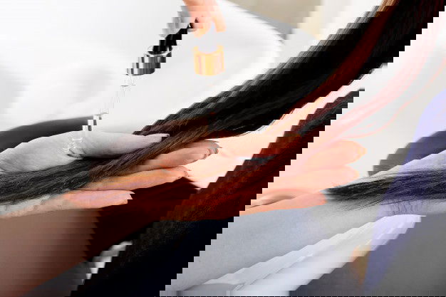 Female Hands Applying Oil Serum Long Womans Brown Hair Treatment Hair Care Cosmetics Bath Beauty Spa Products 221542 429