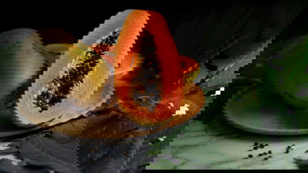 Close Up View Whole Halved Sweet Papaya Wooden Plate 67155 6257 1