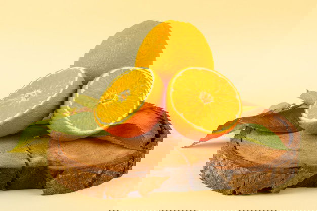 Front View Sliced Orange Whole With Green Leaves Wooden Brown Desk Isolated Fresh Juicy Mellow Cream 140725 18325