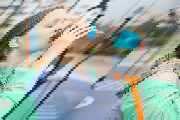 Tired Fit Girl Feeling Thirsty During Physical Exercises 1262 18354 1