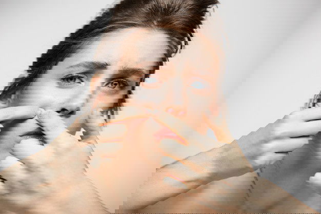 When You Have Changes In Pores &Amp; Skin You Are More Likely To Have Diabetes! 7 Young Brunette Girl Displeased Her Problem Acne Face Skin White Background Health Cosmetology Skincare 176420 14050 1