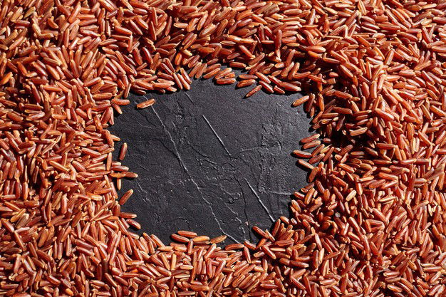 Frame Red Brown Rice Grains With Black Copy Space Stone Surface Dark Table Top View 161301 1377