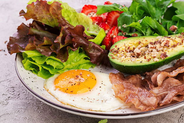 Paleo Diet: Do You Follow This Diet To Lose Weight? 3 Plate With Keto Diet Food Fried Egg Bacon Avocado Arugula Strawberries Keto Breakfast 2829 17292