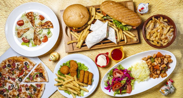 Top View Fast Food Mix Hamburger Doner Sandwich Chicken Nuggets Rice Vegetable Salad Chicken Sticks Caesar Salad Mushrooms Pizza Chicken Ragout French Fries Mayo 141793 3997