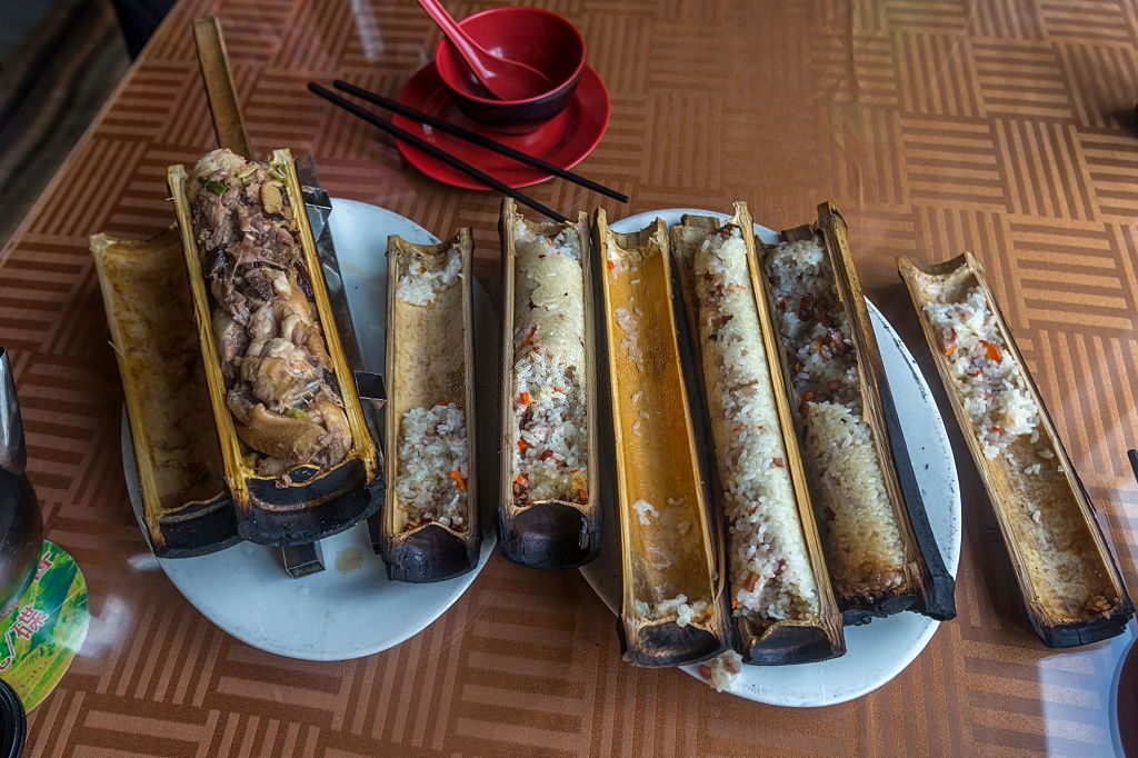 Traditional Chinese Bamboo Rice And Chicken Barbecue At Longsheng Rice Terraces, China. 6083503Da2B7F