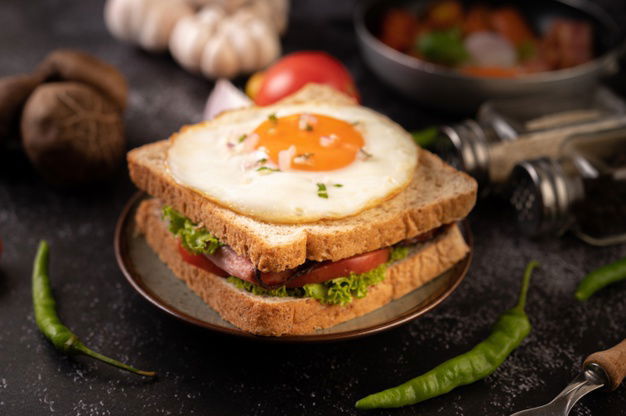 12 Simple Egg Recipes That Your Baby Would Love! 8 Breakfast Sandwich Made With Bread Fried Egg Ham Lettuce 1150 25679