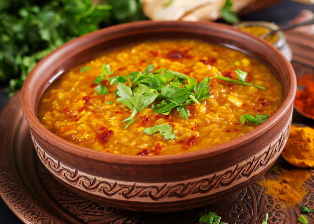 Try These 10 Khichdi Recipes That Your Babies Would Love! 4 Indian Dhal Spicy Curry Bowl Spices Herbs Rustic Black Wooden Table 2829 18712