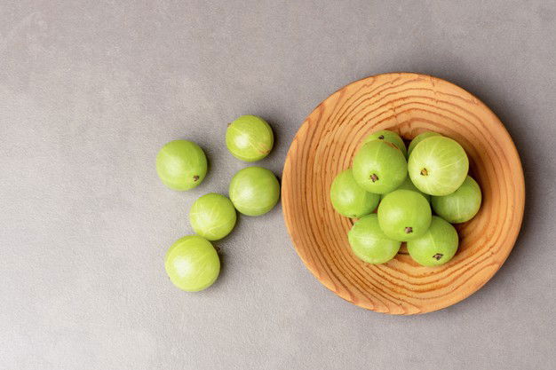 Indian Gooseberry Phyllanthus Emblica Fruits Ceramic Background Top View Flat Lay 313215 1441