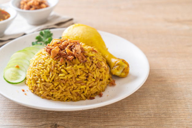 Try These 10 Khichdi Recipes That Your Babies Would Love! 5 Muslim Yellow Rice With Chicken 1339 110918
