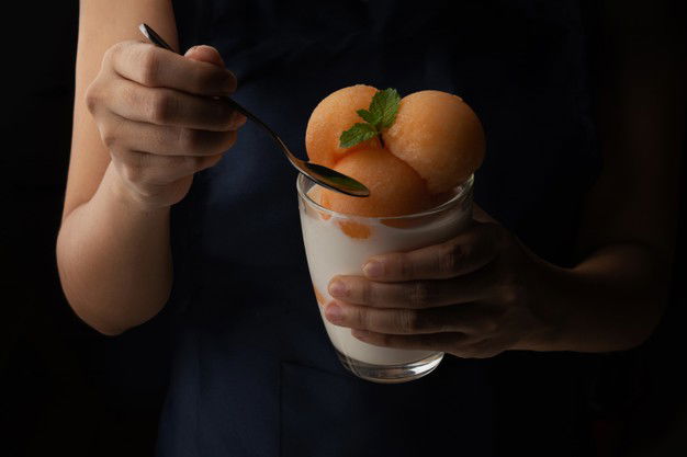 Can I Give My Baby Muskmelons? Is It Healthy? 5 Yellow Flesh Melon Was Scooped Into Round Ball Like Ice Cream Put Into Clear Glass Topped With Fresh Milk Sweet Delicious Take Picture Black Background 35063 885