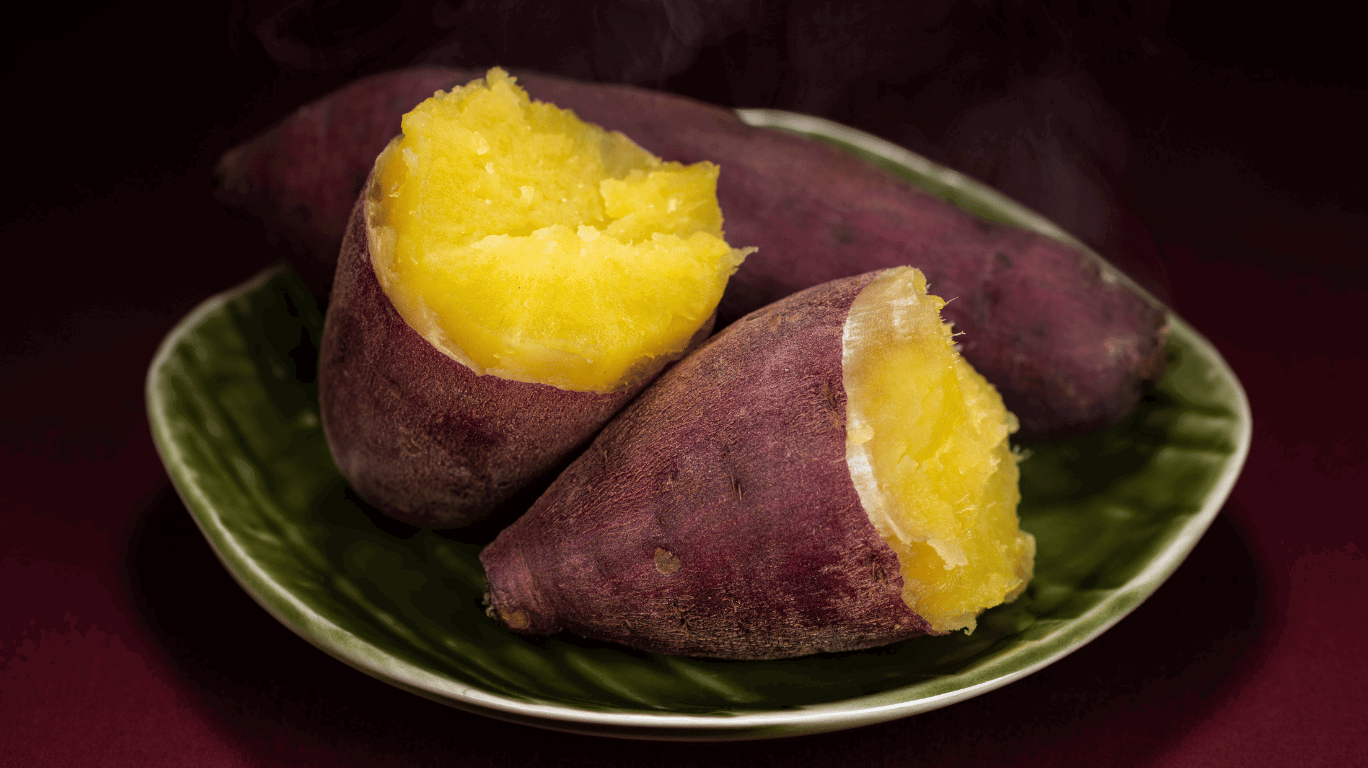 Pureed Sweet Potatoes Blended With Breast Milk For A Nutritious, Creamy Baby Food