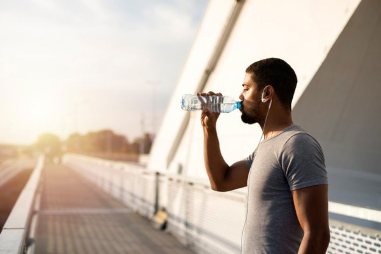 Attractive Athlete Holding Bottle Water Drinking Before Training 342744