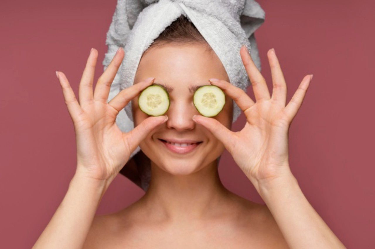 Beautiful Woman Using Cucumber Slices Eyes 23