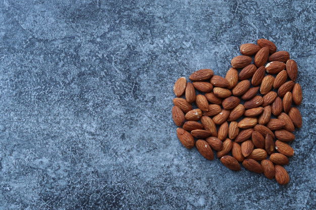 Buy Almonds At Chennai At The Best Price! 3 Heart Shaped Almonds Grey Concrete Table 169694 34