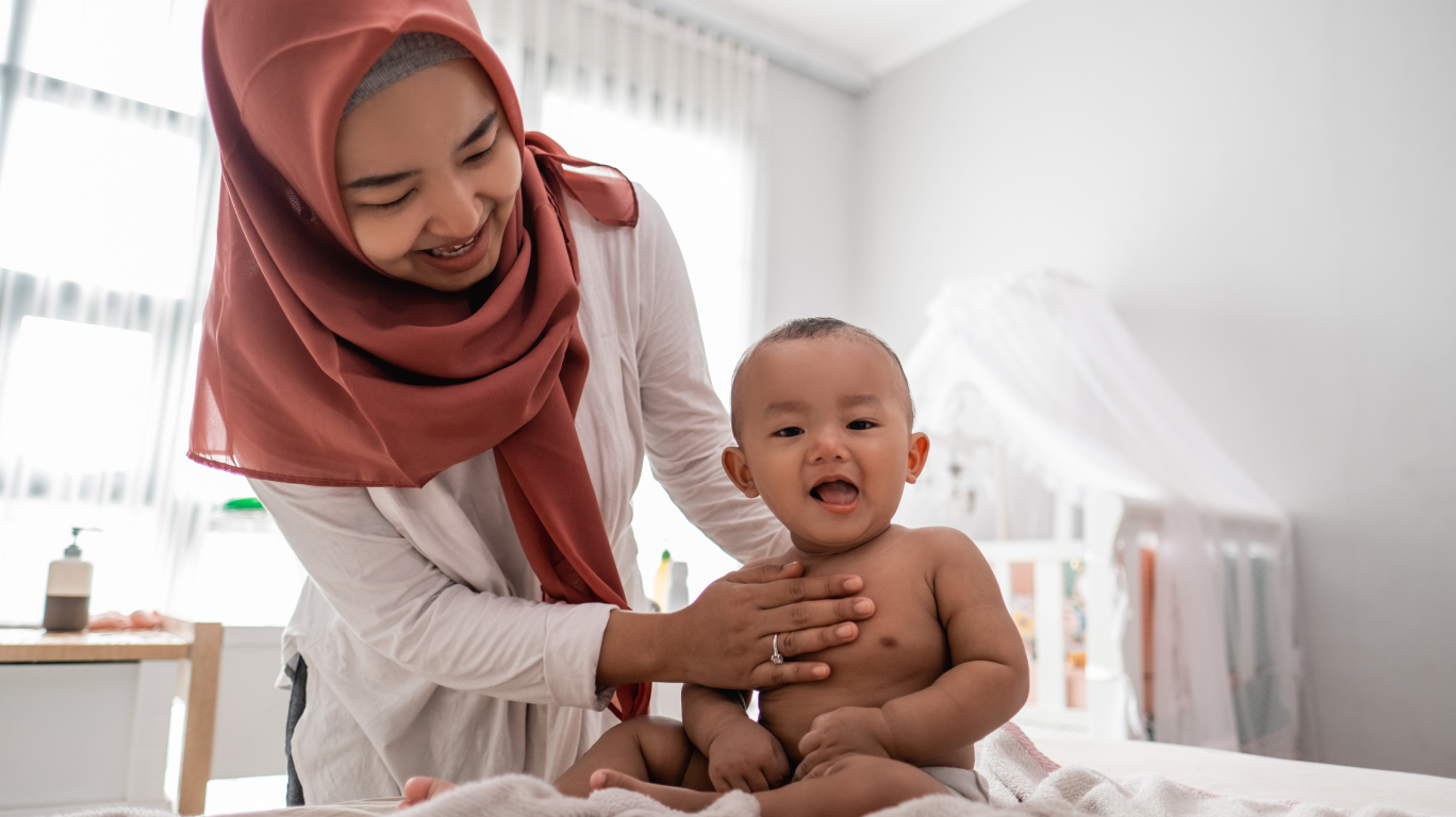Bottles Of Baby-Safe Cooking Oils Such As Olive Oil, Coconut Oil, And Avocado Oil, Displayed On A Kitchen Counter With Baby Food In The Background