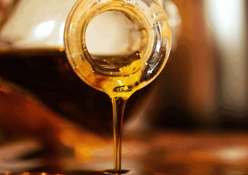 Bottles Of Refined Oil With Labels Highlighting Health Risks Like Obesity, Heart Disease, And Nutrient Loss